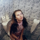 A pretty Italian girl records herself farting and shitting while sitting on a toilet at her friends home. Soft plops can be heard. She wipes her ass, and poop can be seen on her TP. Presented in 720P HD. Over 6.5 minutes.